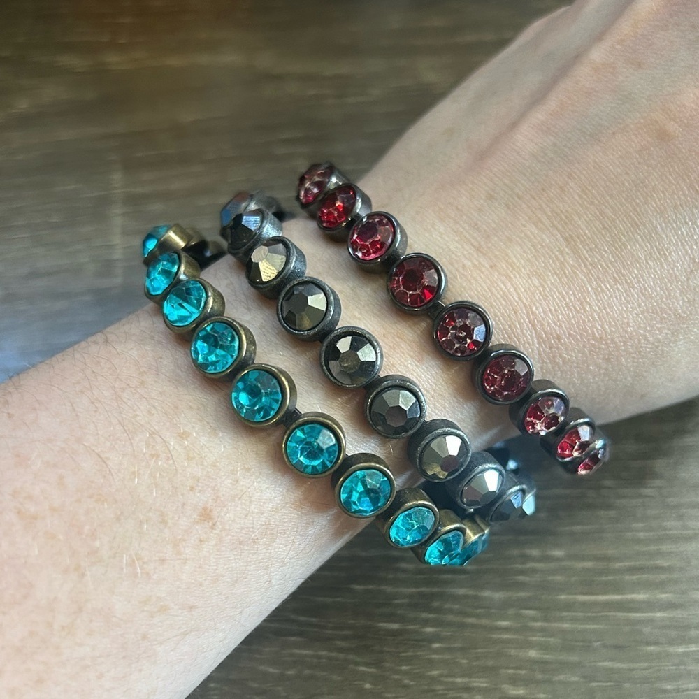 Set of 3 slip on bracelets, blue, red, and black